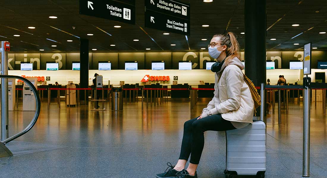 Sitting on luggage